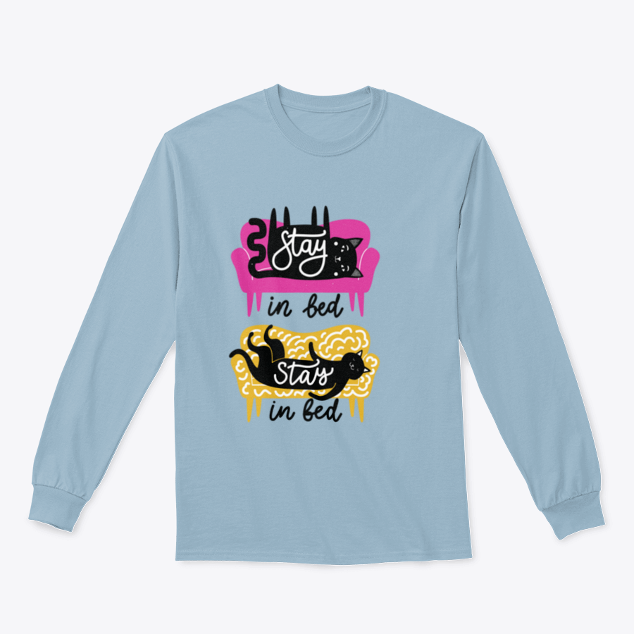 A cozy apparel featuring cats on a sofa with the text 'Stay In Bed', perfect for cat lovers.