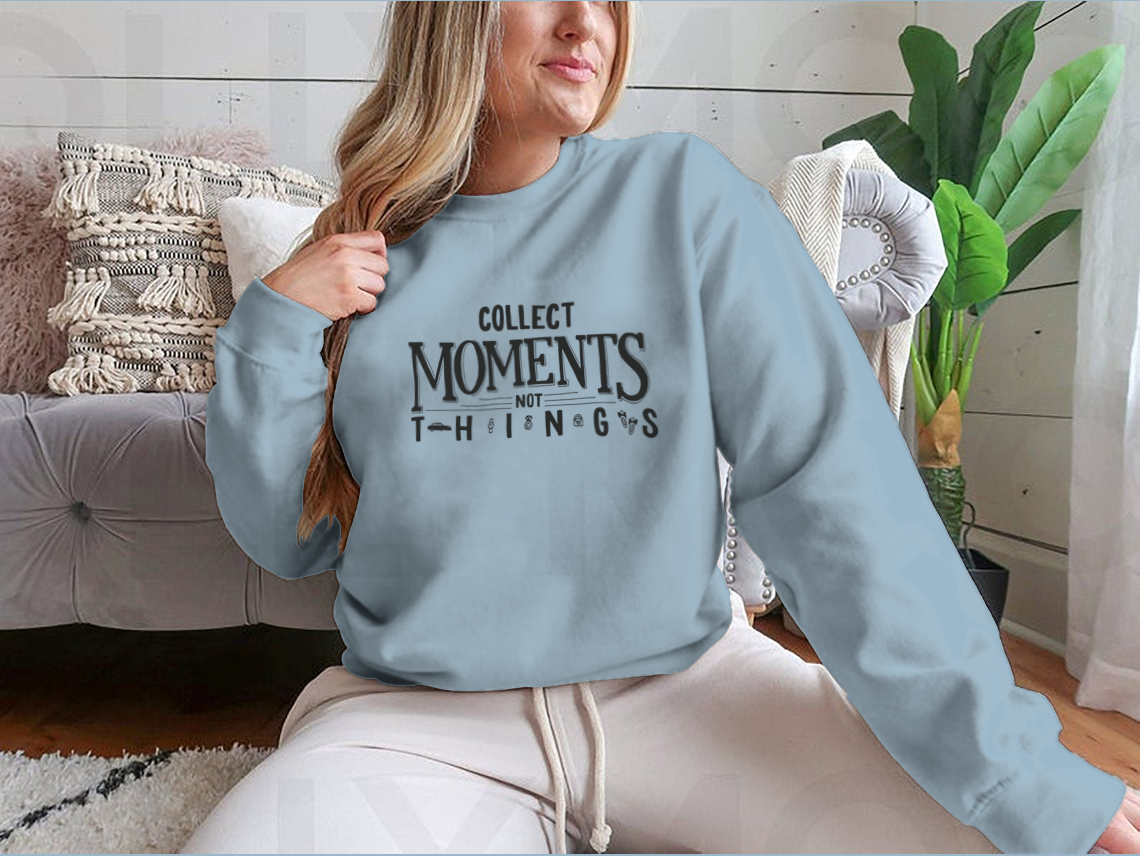 A comfortable t-shirt featuring the inspirational quote 'Collect Moments, Not Things' in a stylish design, perfect for motivation.