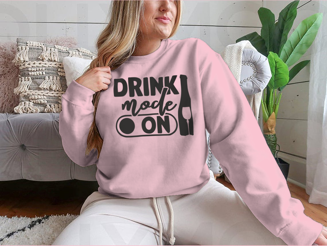 A stylish sweatshirt featuring the phrase 'Drink Mode On', made from soft cotton fabric, perfect for casual wear.