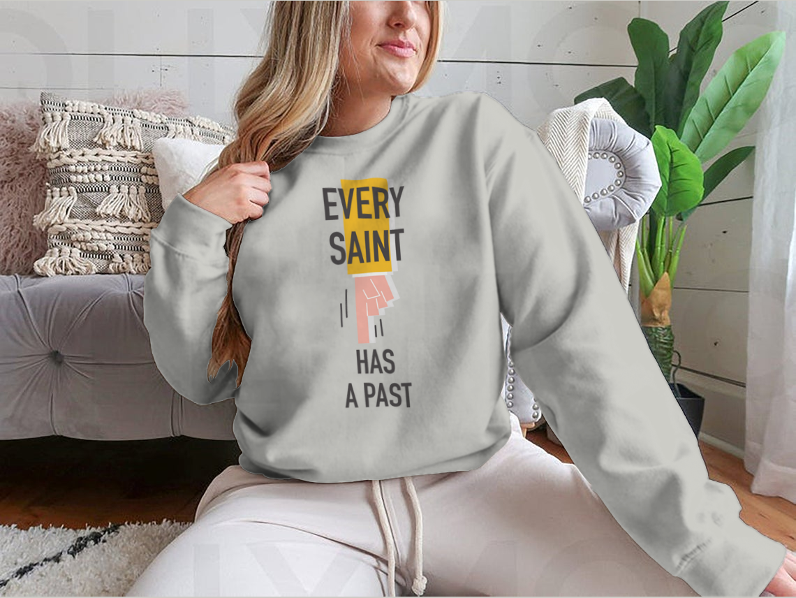 Every Saint Has A Past motivational quote sweatshirt featuring a classic fit and soft fabric blend.