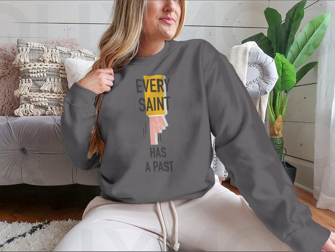 Every Saint Has A Past motivational quote sweatshirt featuring a classic fit and soft fabric blend.