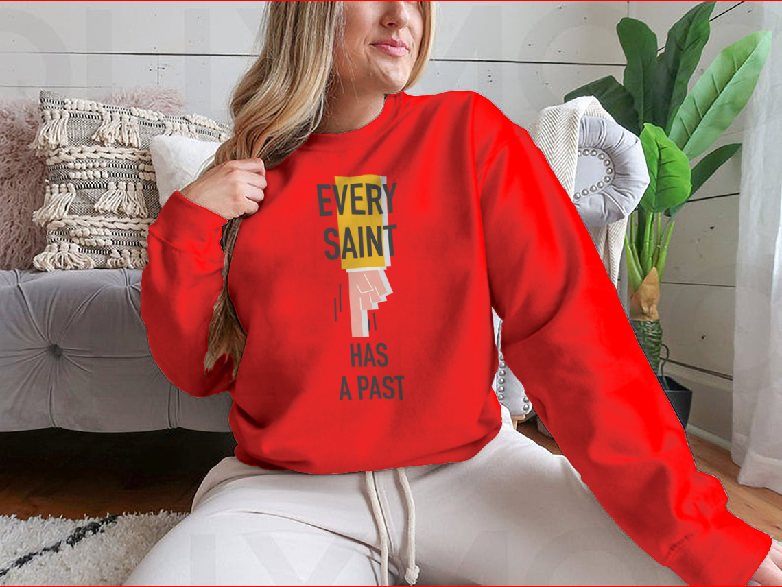 Every Saint Has A Past motivational quote sweatshirt featuring a classic fit and soft fabric blend.