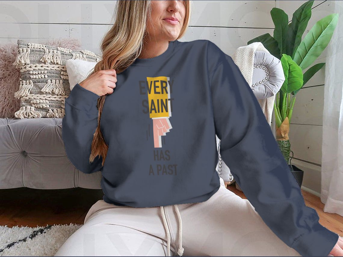 Every Saint Has A Past motivational quote sweatshirt featuring a classic fit and soft fabric blend.