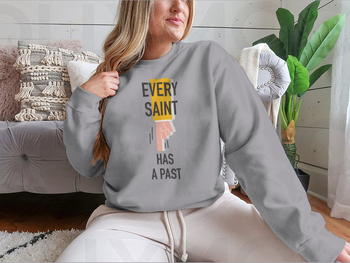 Every Saint Has A Past motivational quote sweatshirt featuring a classic fit and soft fabric blend.
