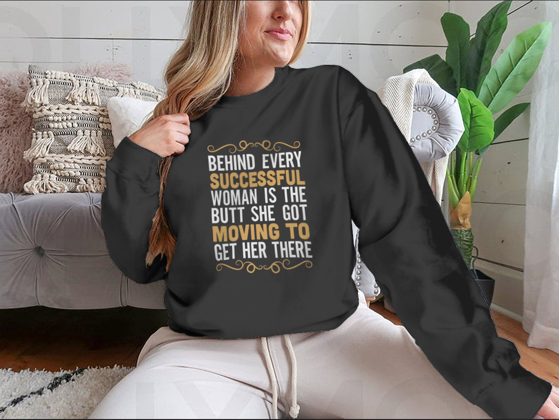 A stylish Fitness Quote t-shirt featuring the phrase 'Behind Every Successful Woman Is The Butt She Got', made from soft cotton fabric.