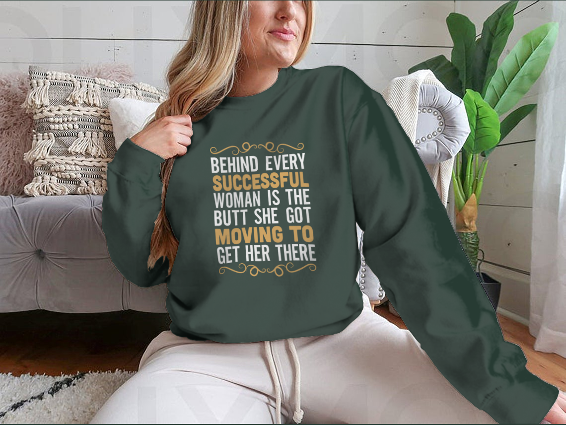 A stylish Fitness Quote t-shirt featuring the phrase 'Behind Every Successful Woman Is The Butt She Got', made from soft cotton fabric.