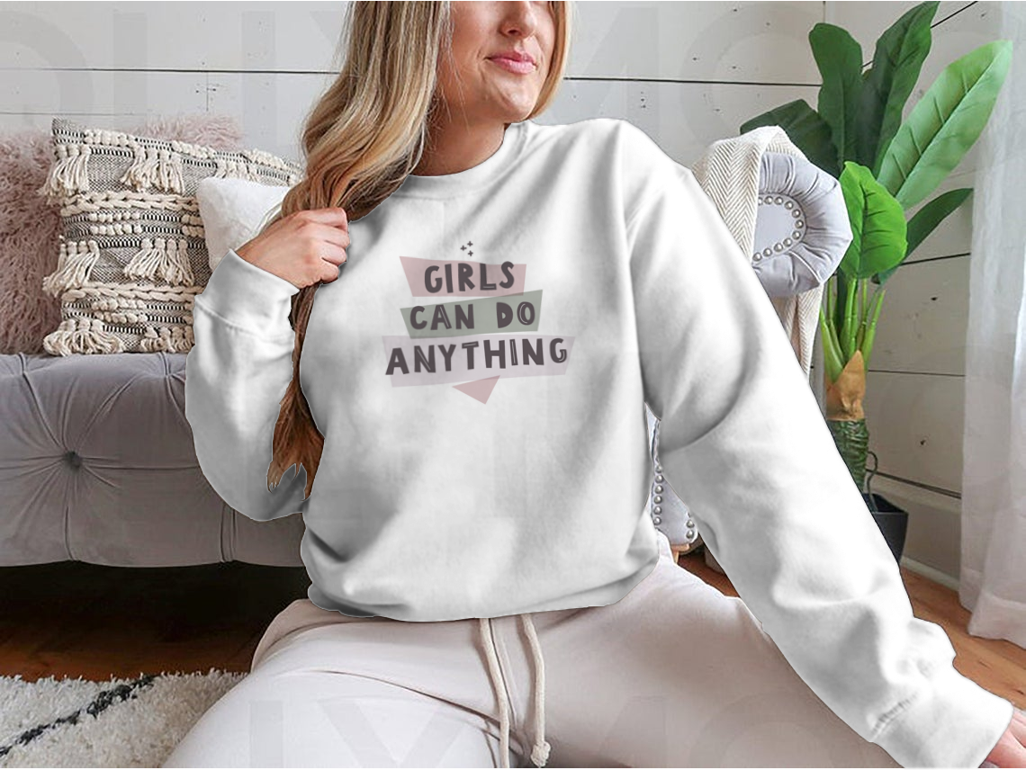 Colorful Girls Can Do Anything graphic design shirt featuring a feminist quote, made from 100% cotton with a classic fit.