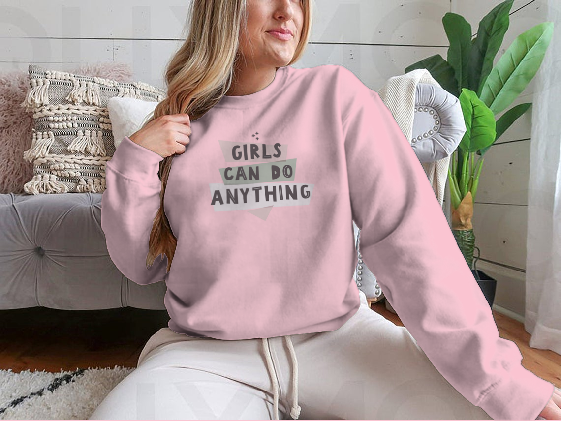 Colorful Girls Can Do Anything graphic design shirt featuring a feminist quote, made from 100% cotton with a classic fit.