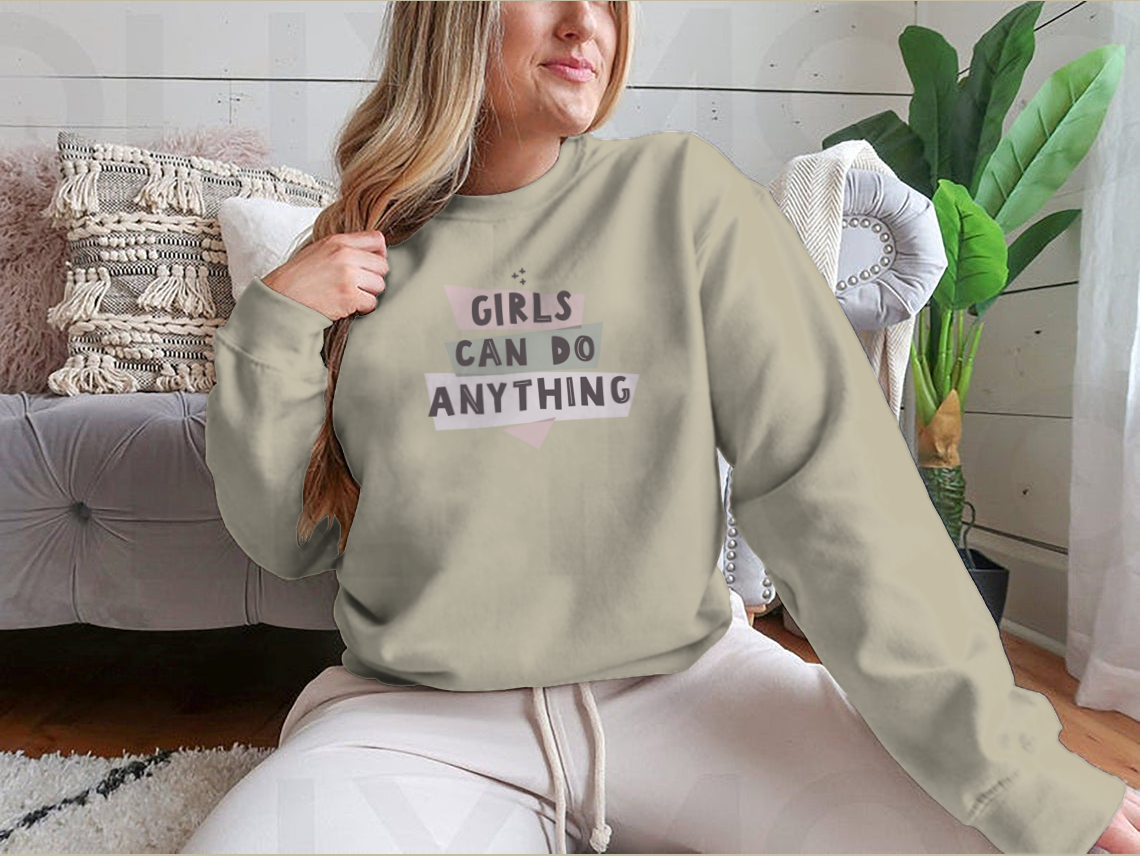 Colorful Girls Can Do Anything graphic design shirt featuring a feminist quote, made from 100% cotton with a classic fit.