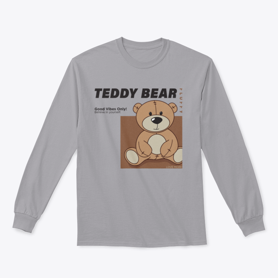 A cozy apparel featuring a teddy bear design with the phrase 'Good Vibes Only' promoting positivity and self-belief.
