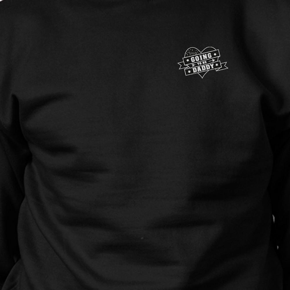Unisex black sweatshirt with 'Going To Be Daddy' design, perfect gift for Father's Day.