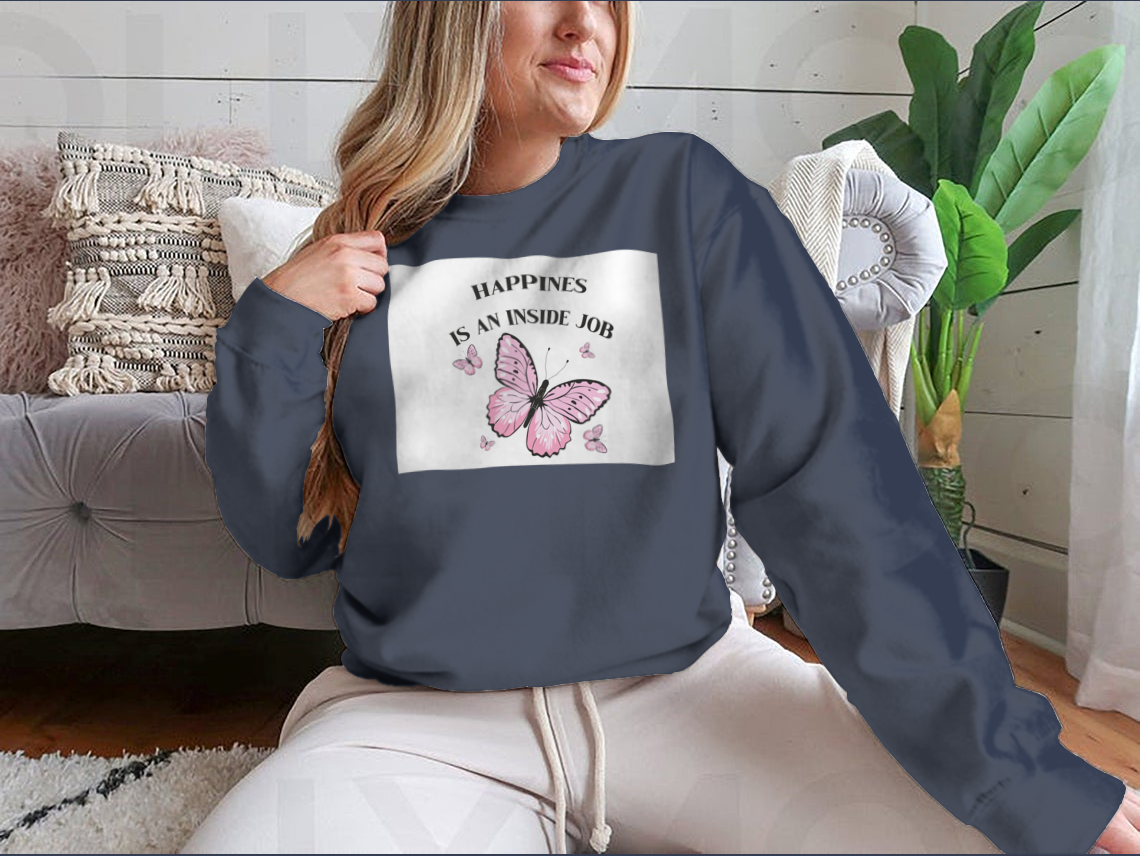 A stylish shirt featuring a pink butterflies design with the phrase 'Happiness Is An Inside Job', made from soft cotton fabric.