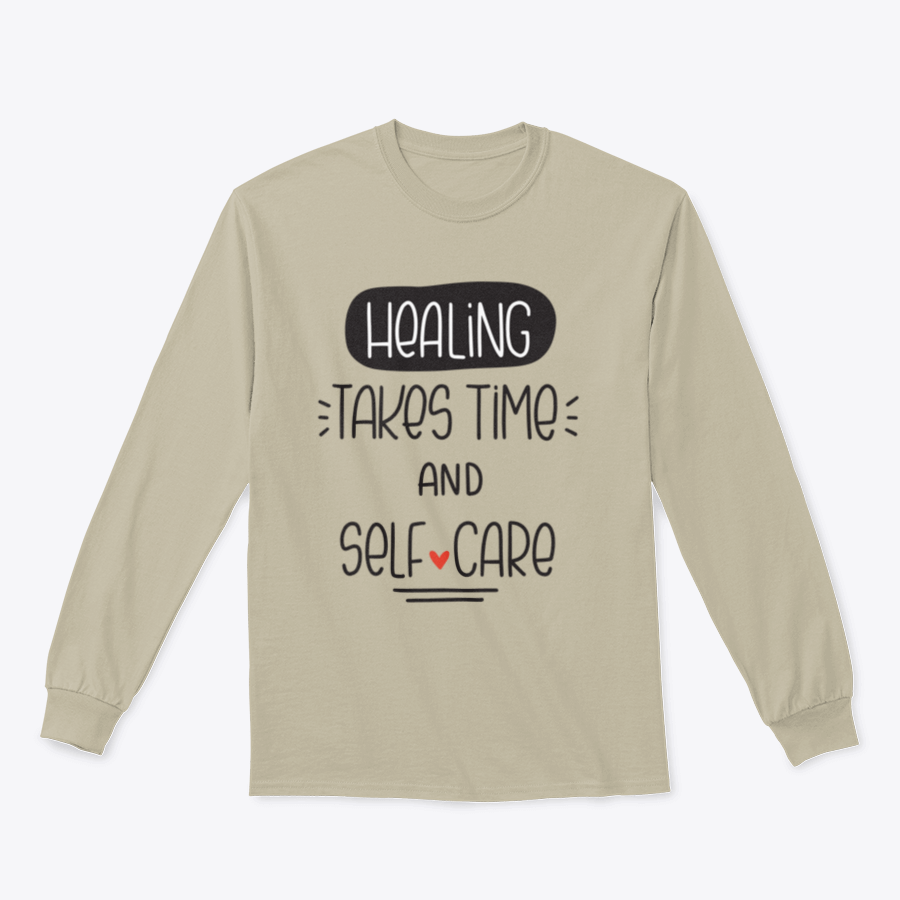 A cozy sweatshirt featuring the quote 'Healing Takes Time And Self-Care' in a stylish vector design, perfect for casual wear.