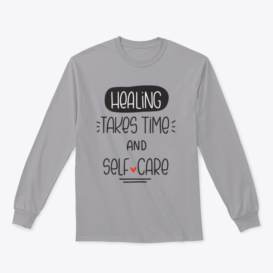 A cozy sweatshirt featuring the quote 'Healing Takes Time And Self-Care' in a stylish vector design, perfect for casual wear.