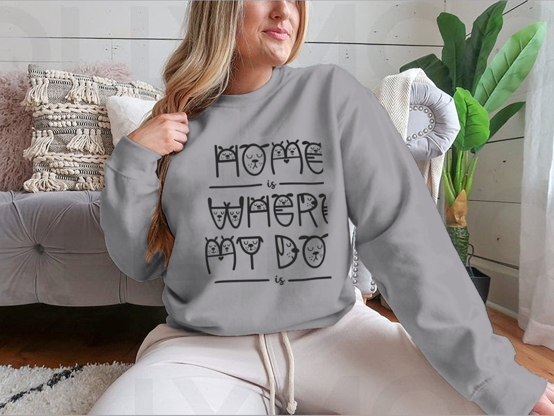 A stylish home decor piece featuring the quote 'Home Is Where My Dog Is' in a playful lettering style, perfect for dog lovers.