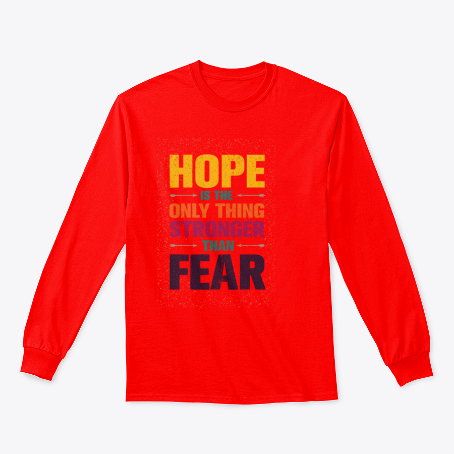 A stylish t-shirt featuring the inspirational quote 'Hope Is The Only Thing Stronger Than Fear' in a classic fit, made from a comfortable cotton-polyester blend.