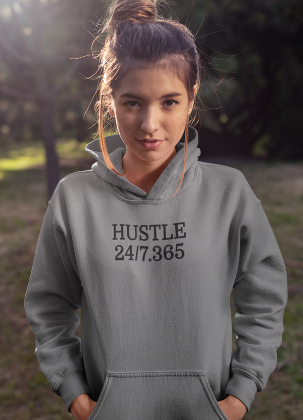 Hustle Harder Women Hoodie featuring a cozy fleece lining and adjustable hood, designed by top artists for stylish self-expression.