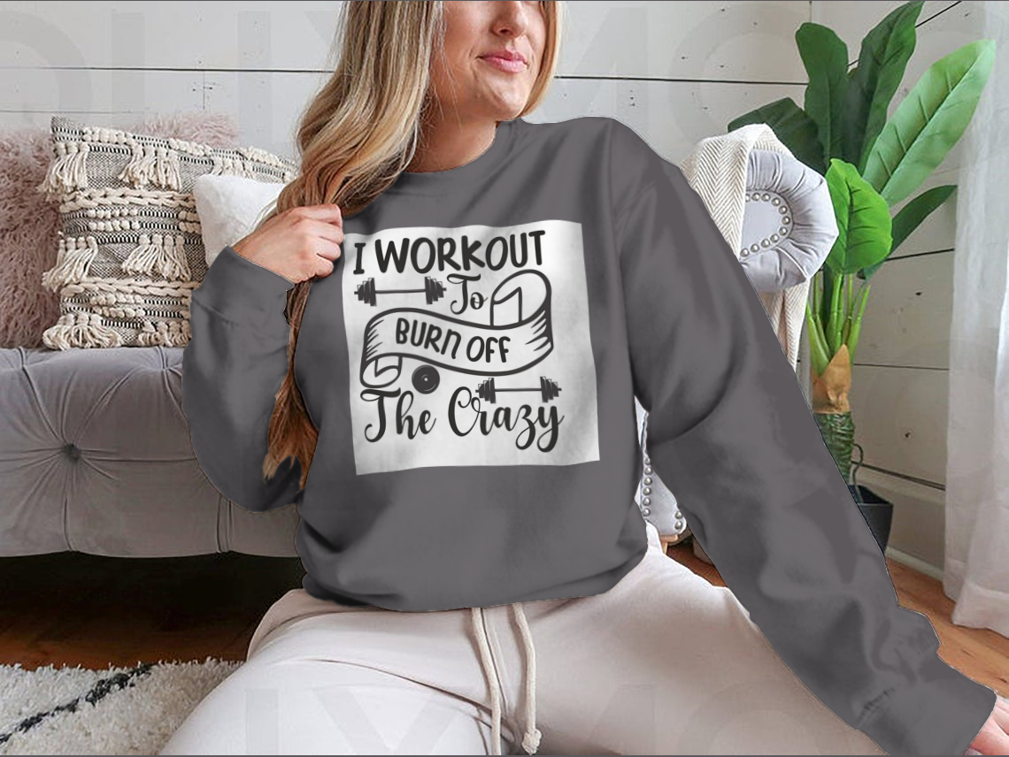 A stylish sweatshirt featuring the phrase 'I Workout To Burn Off The Crazy', made from soft cotton fabric, perfect for fitness enthusiasts.