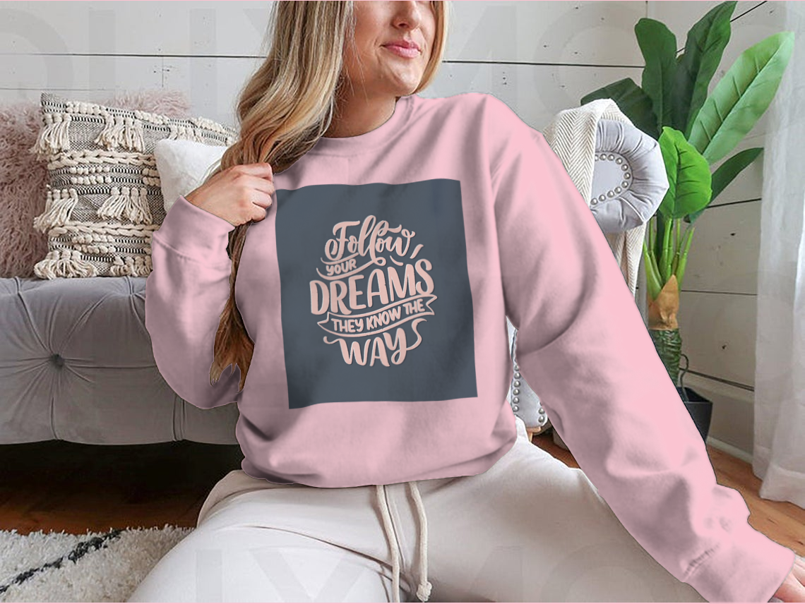 Hand-drawn vintage illustration featuring an inspirational quote about dreams on a soft cotton fabric.