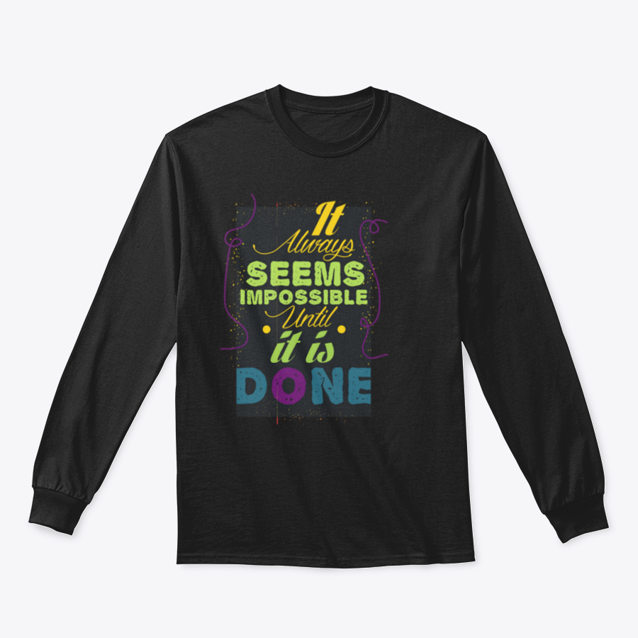 A cozy sweatshirt featuring the inspirational quote 'It Seems Impossible Until It's Done' in stylish typography, perfect for motivation.