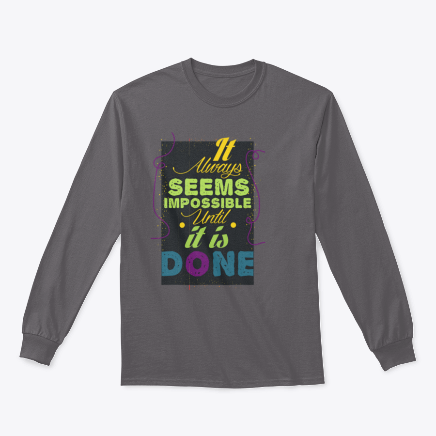 A cozy sweatshirt featuring the inspirational quote 'It Seems Impossible Until It's Done' in stylish typography, perfect for motivation.