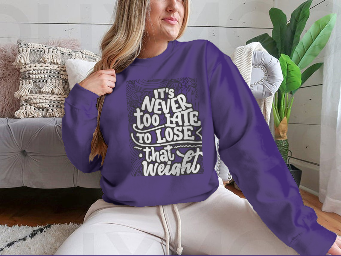 A motivational coloring design featuring the quote 'It's Never Too Late To Lose That Weight' on a soft cotton blend fabric.