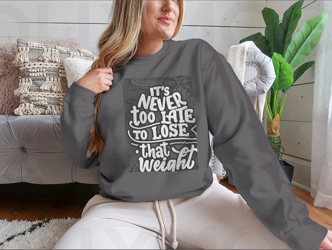 A motivational coloring design featuring the quote 'It's Never Too Late To Lose That Weight' on a soft cotton blend fabric.