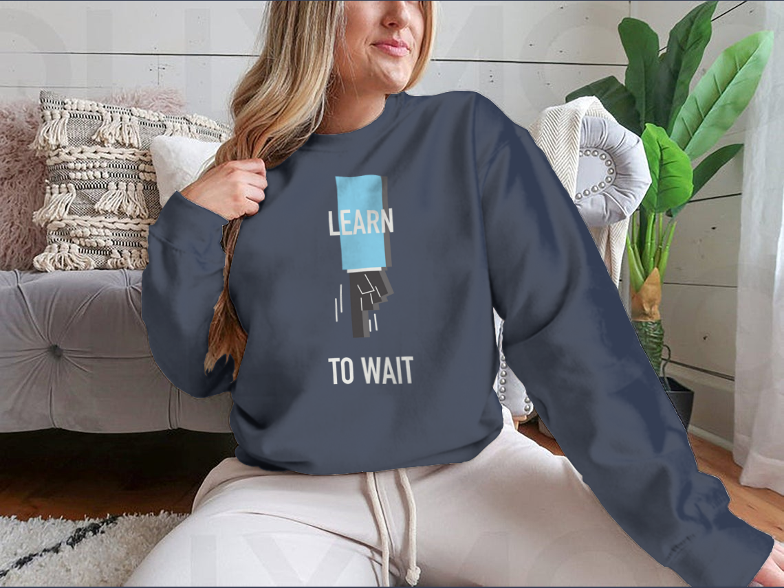 A stylish Learn To Wait Inspirational T-Shirt featuring a motivational quote design, made from soft 100% cotton fabric.