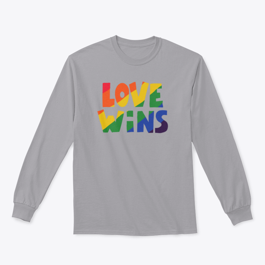 A stylish shirt featuring 'Love Wins' lettering with a vibrant rainbow design, made from soft cotton fabric.