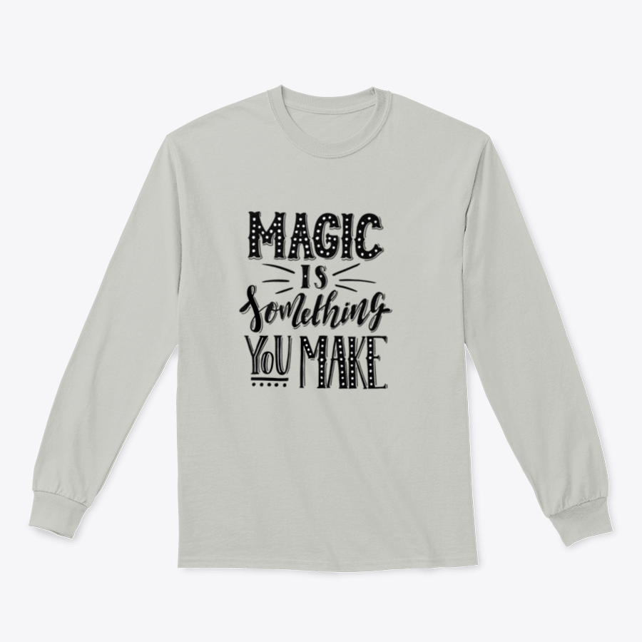 A comfortable t-shirt featuring a hand-drawn illustration that reads 'Magic Is Something You Make', showcasing creativity and style.