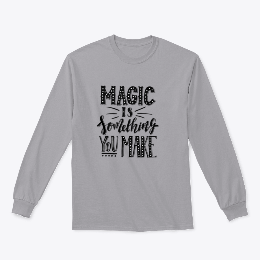 A comfortable t-shirt featuring a hand-drawn illustration that reads 'Magic Is Something You Make', showcasing creativity and style.