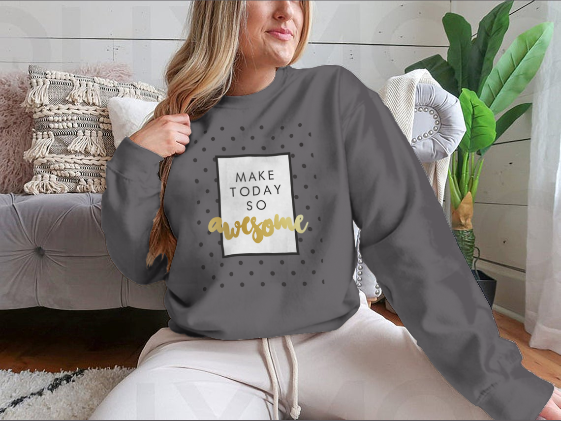 A stylish t-shirt featuring the inspirational phrase 'Make Today So Awesome' in modern calligraphy design, showcasing a blend of cotton and polyester fabric.