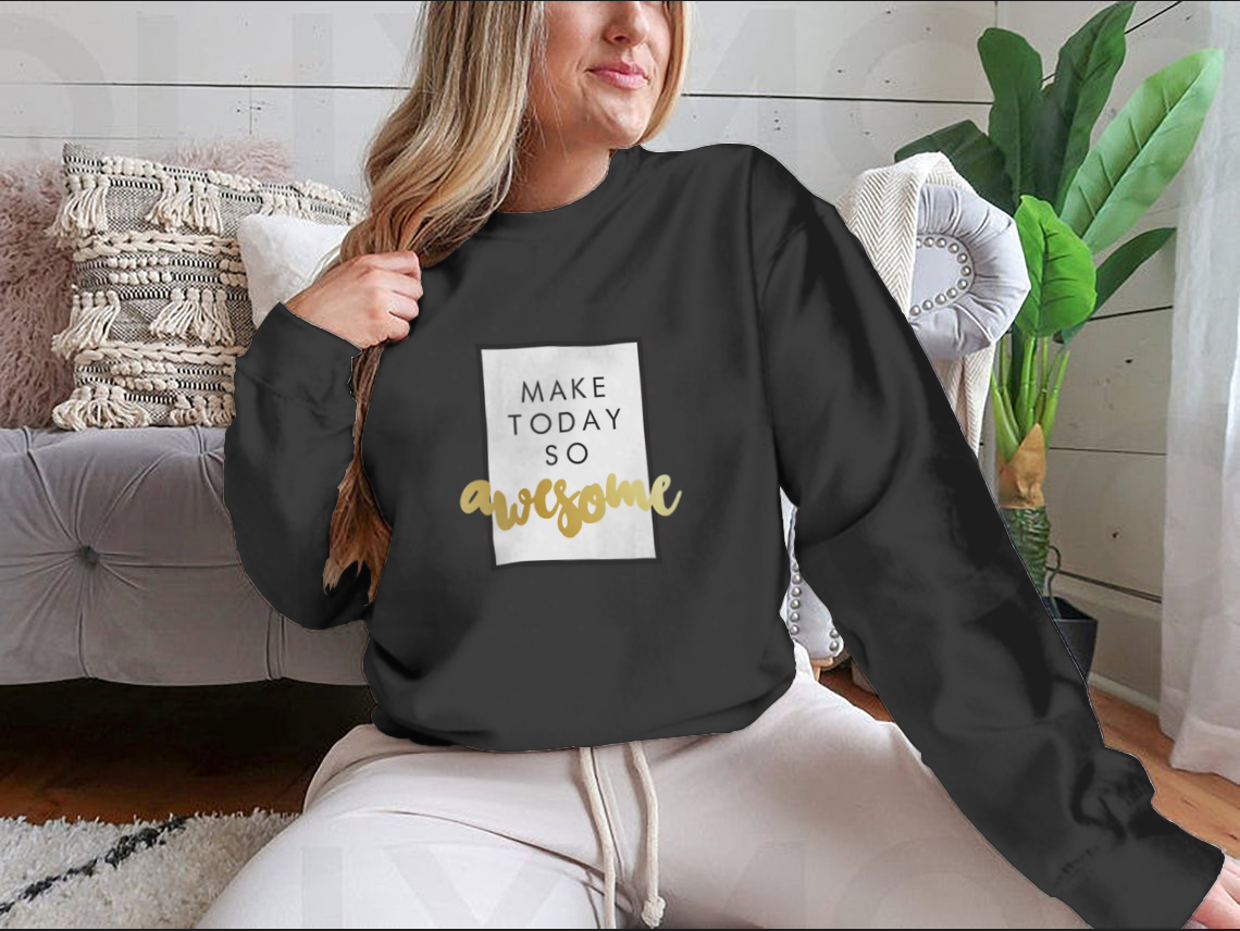 A stylish t-shirt featuring the inspirational phrase 'Make Today So Awesome' in modern calligraphy design, showcasing a blend of cotton and polyester fabric.