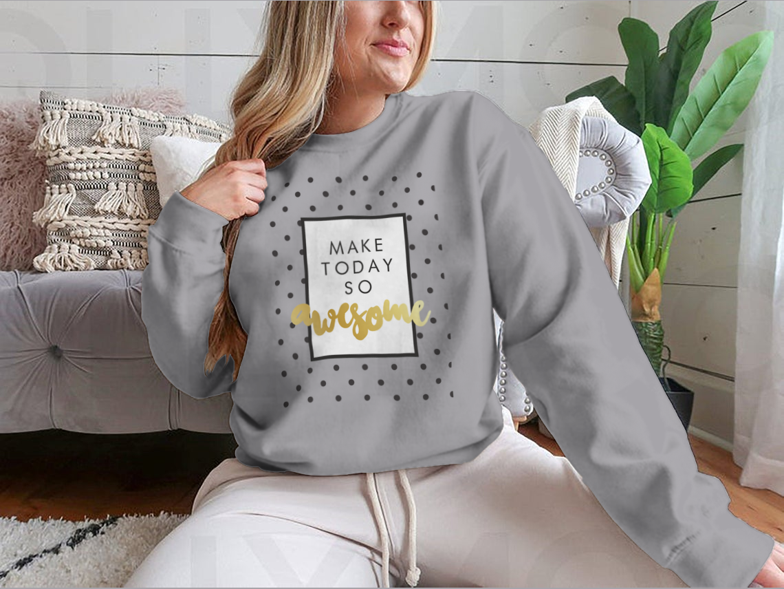 A stylish t-shirt featuring the inspirational phrase 'Make Today So Awesome' in modern calligraphy design, showcasing a blend of cotton and polyester fabric.