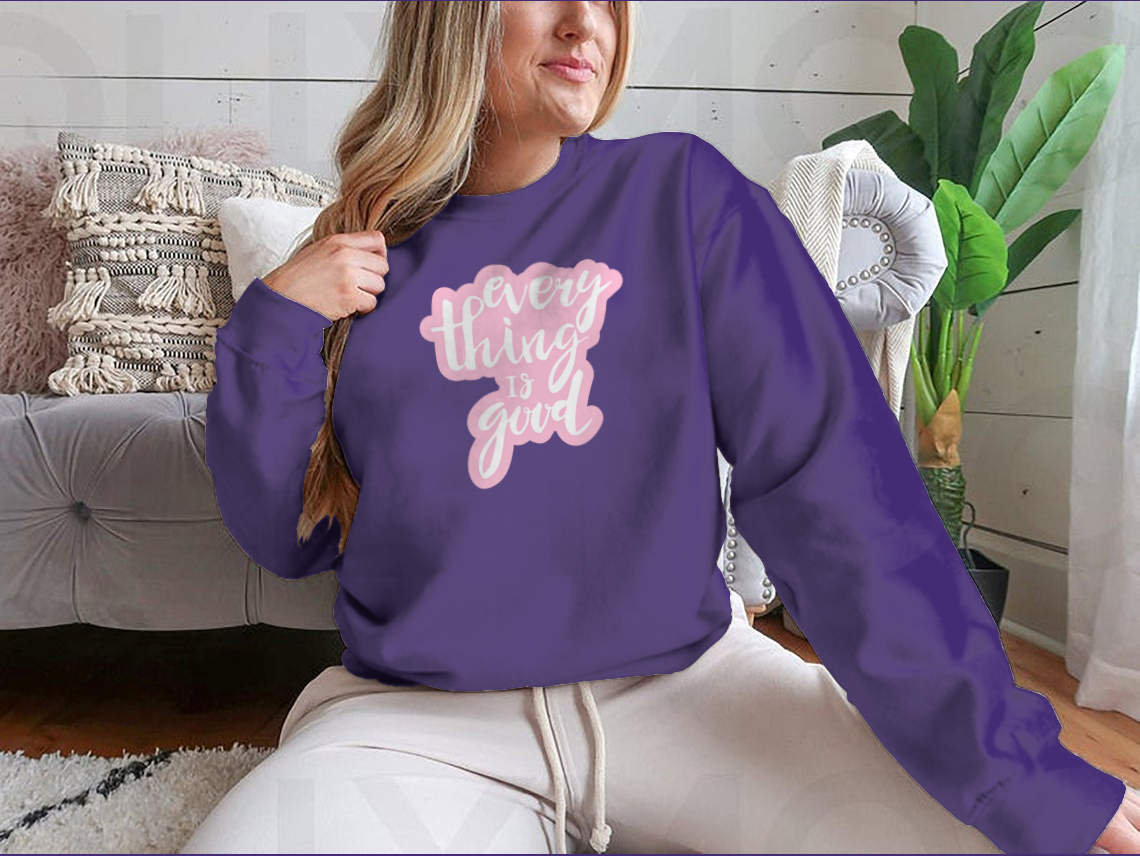 Motivational Quotes apparel featuring hand-drawn lettering on a cotton blend fabric, showcasing a stylish and inspiring design.