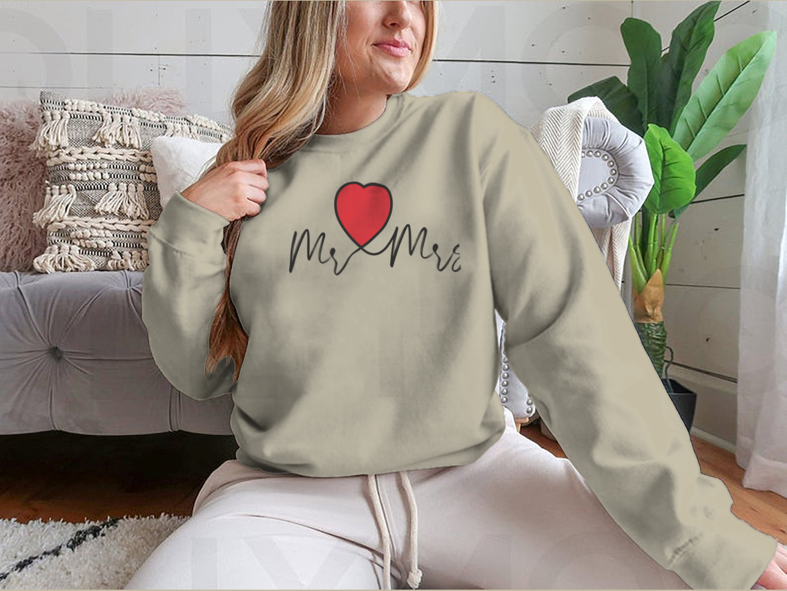 Mr And Mrs Wedding Decoration Sweatshirt featuring heart motifs, made from soft cotton fabric.
