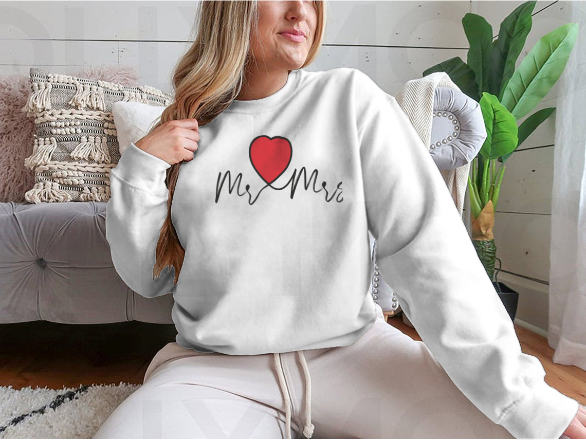 Mr And Mrs Wedding Decoration Sweatshirt featuring heart motifs, made from soft cotton fabric.