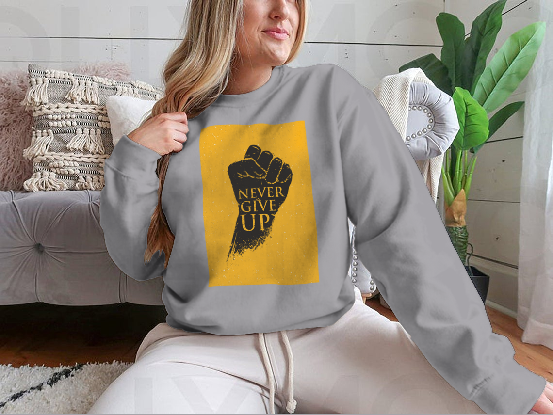 A stylish sweatshirt featuring the motivational phrase 'Never Give Up' in bold lettering, made from a comfortable cotton/polyester blend.