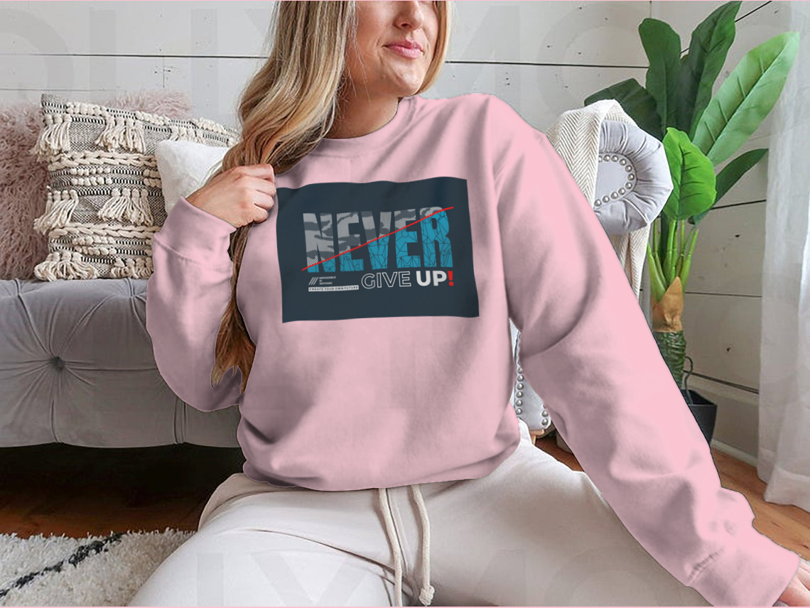 A stylish 'Never Give Up' motivational T-shirt made from 100% cotton, featuring modern typography in a classic fit.