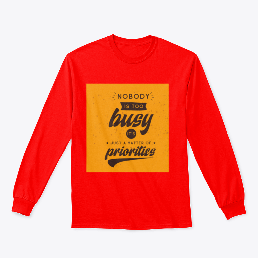 A motivational T-shirt featuring the quote 'Nobody Is Too Busy It's Just A Matter Of Priorities' in stylish typography, perfect for inspiring wearers.