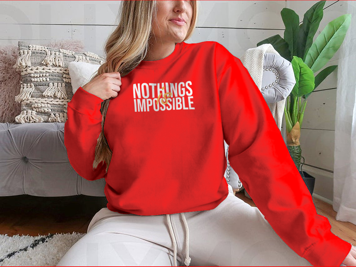 A stylish cotton shirt featuring the inspirational quote 'Nothing Is Impossible' in a bold font, perfect for casual wear.