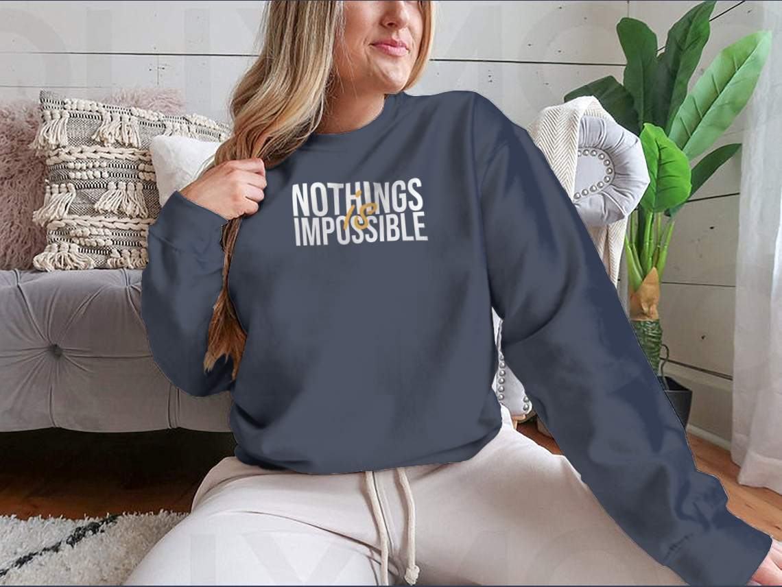A stylish cotton shirt featuring the inspirational quote 'Nothing Is Impossible' in a bold font, perfect for casual wear.