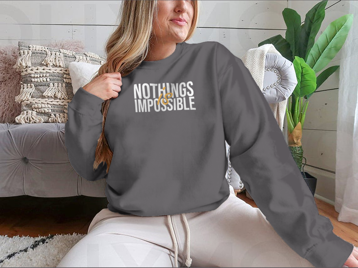 A stylish cotton shirt featuring the inspirational quote 'Nothing Is Impossible' in a bold font, perfect for casual wear.
