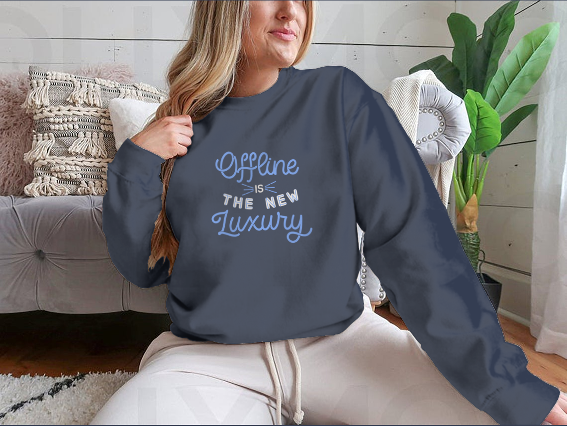 A beautifully designed card featuring hand-drawn lettering that reads 'Offline Is The New Luxury', showcasing a blend of cotton and polyester materials.