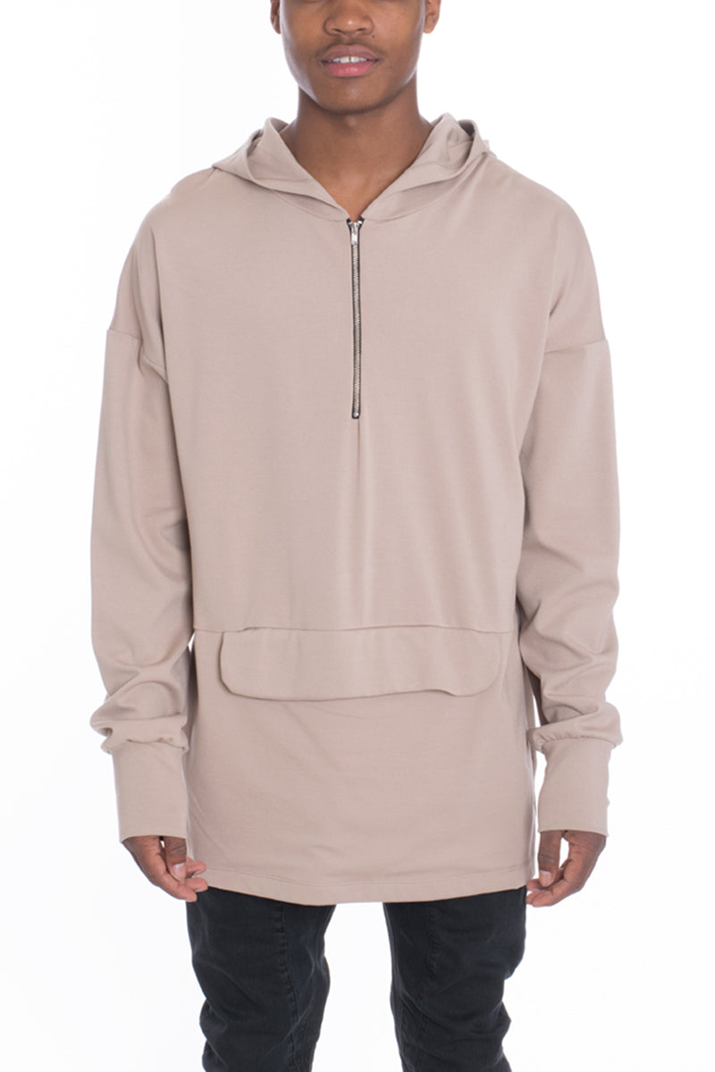 A stylish Pouch Pullover Hoodie featuring a unique front flap design and quarter zip, made from a soft viscose blend.