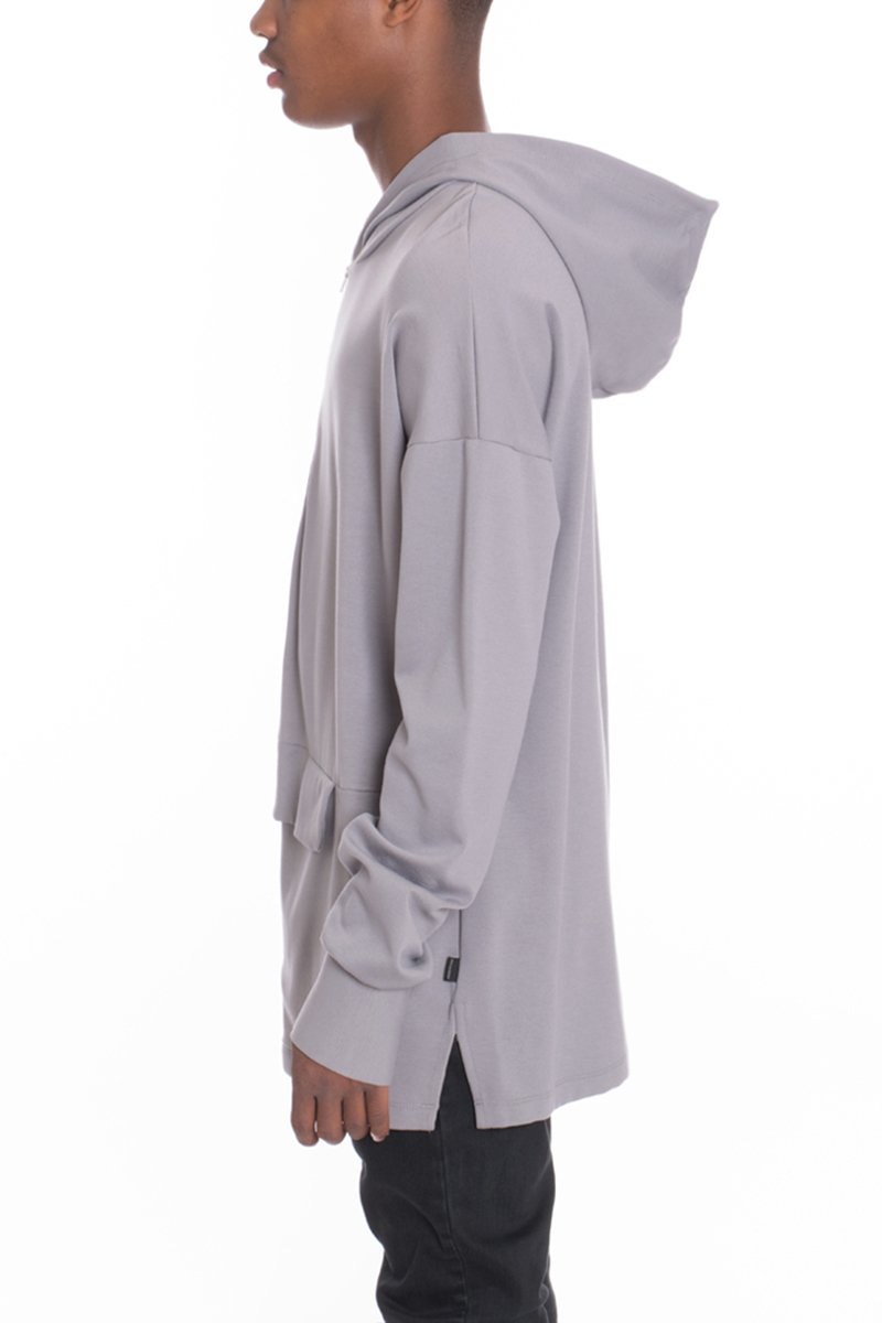 A stylish Pouch Pullover Hoodie featuring a unique front flap design and quarter zip, made from a soft viscose blend.