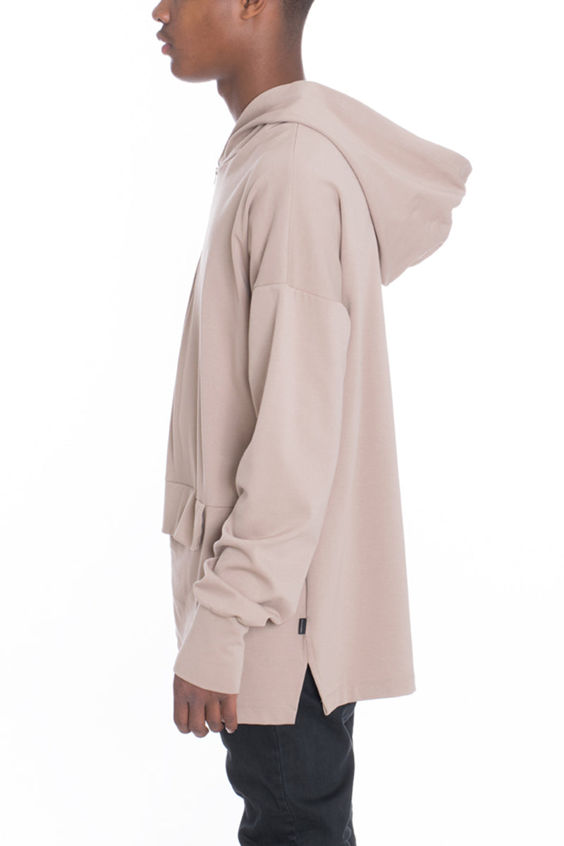 A stylish Pouch Pullover Hoodie featuring a unique front flap design and quarter zip, made from a soft viscose blend.