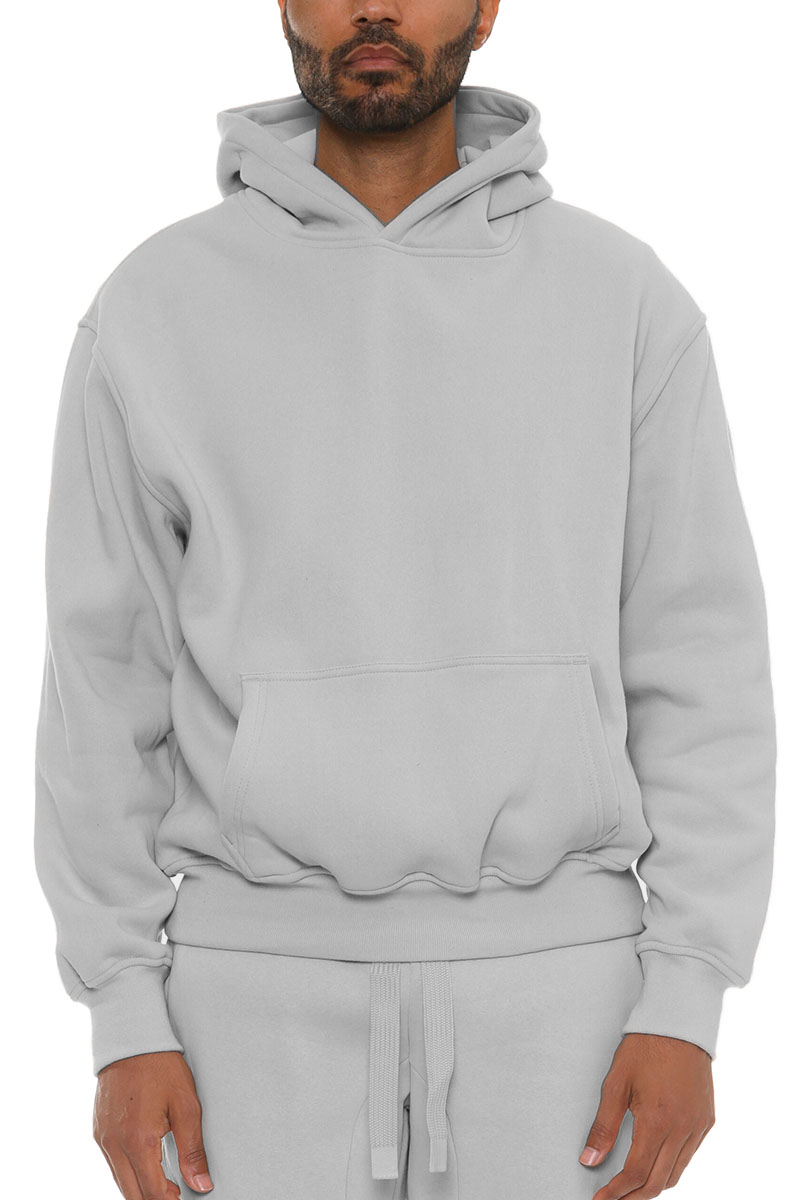 A stylish Premium Cotton Blend Hoodie in a neutral color, featuring a hood and standard pocket, displayed on a mannequin.