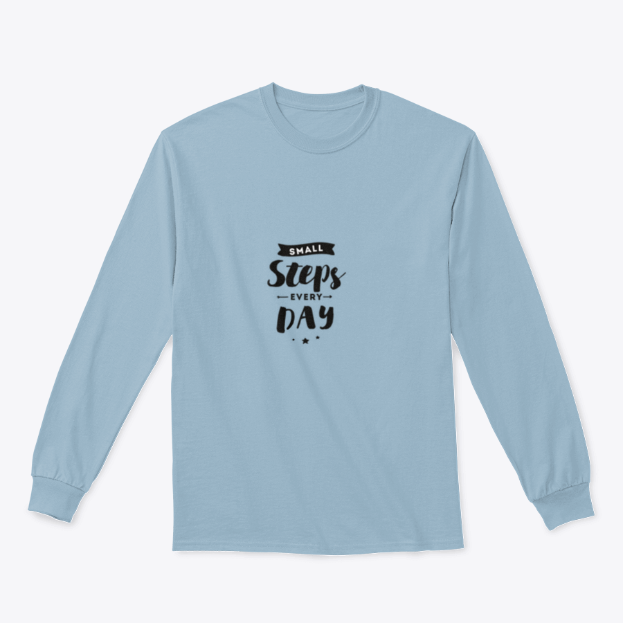 A stylish t-shirt featuring the motivational quote 'Small Steps Every Day' designed for comfort and inspiration.