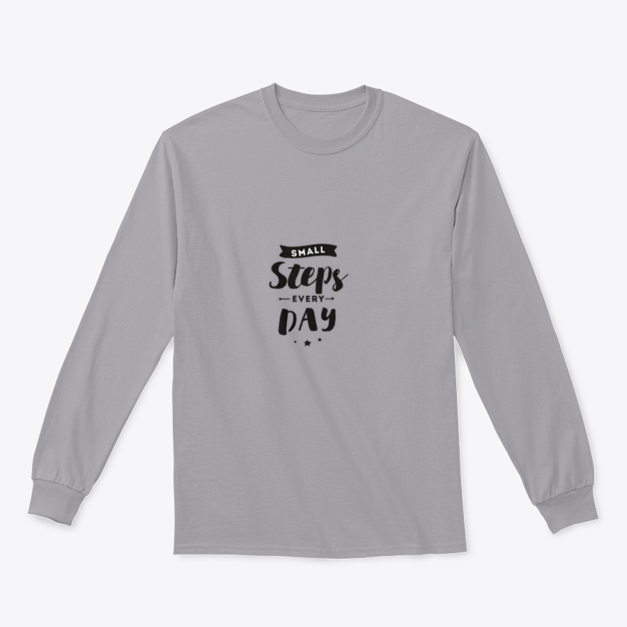 A stylish t-shirt featuring the motivational quote 'Small Steps Every Day' designed for comfort and inspiration.